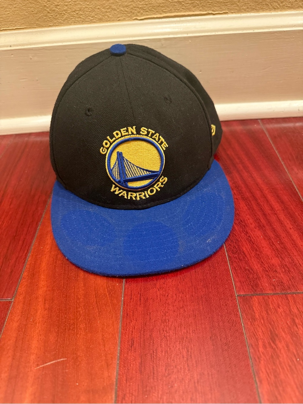 New Era Golden State Warriors Black and Blue Snapback Hat with Yellow Logo
